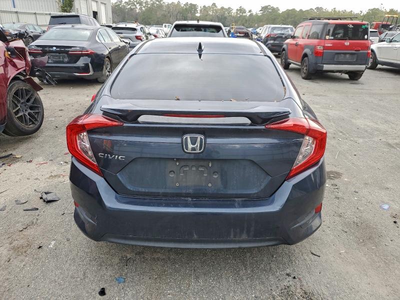Photo 6 from auction – 2018 HONDA CIVIC with VIN 19XFC2F70JE031386