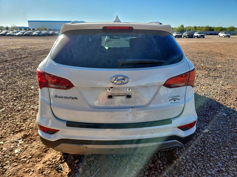 Photo 6 from auction – 2017 HYUNDAI SANTA FE S with VIN 5NMZU3LB3HH022600