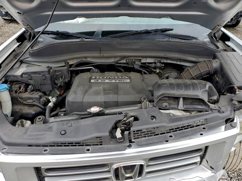 Photo 11 from auction – 2007 HONDA RIDGELINE with VIN 2HJYK16587H533107