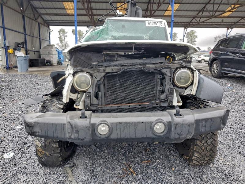 Photo 5 from auction – 2015 JEEP WRANGLER U with VIN 1C4BJWFG4FL572922