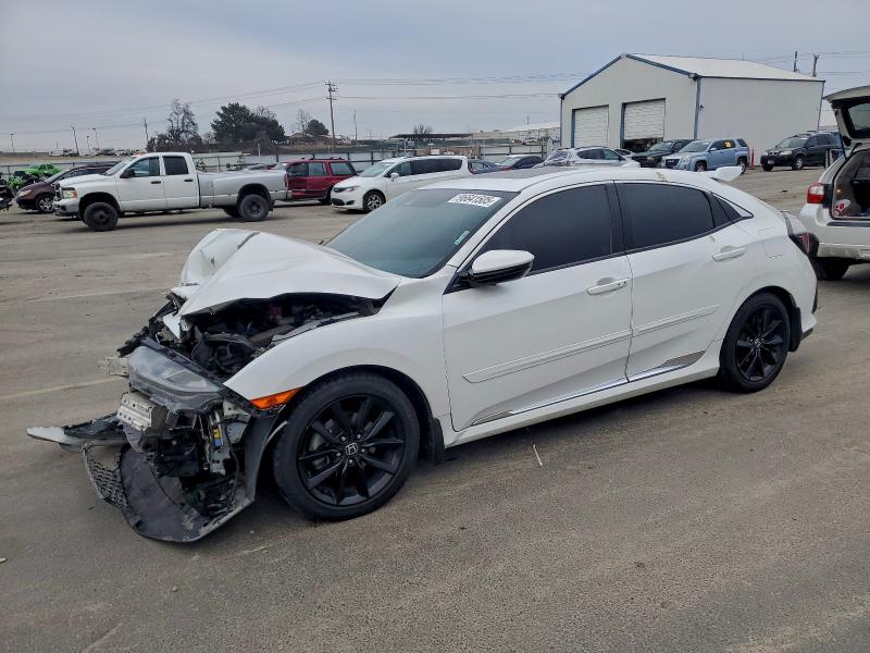 HONDA CIVIC EX 2020 with VIN SHHFK7H65LU211432 - Photo from auction