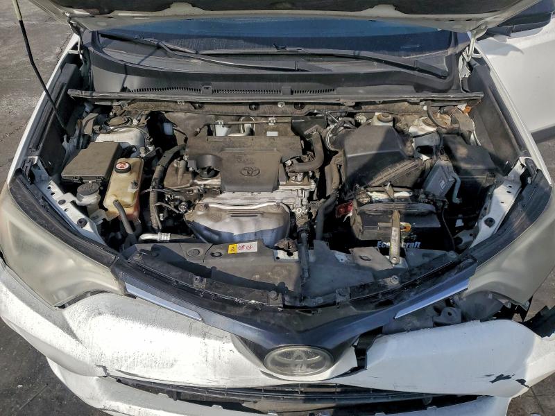 Photo 11 from auction – 2018 TOYOTA RAV4 LE with VIN JTMZFREVXJJ171011