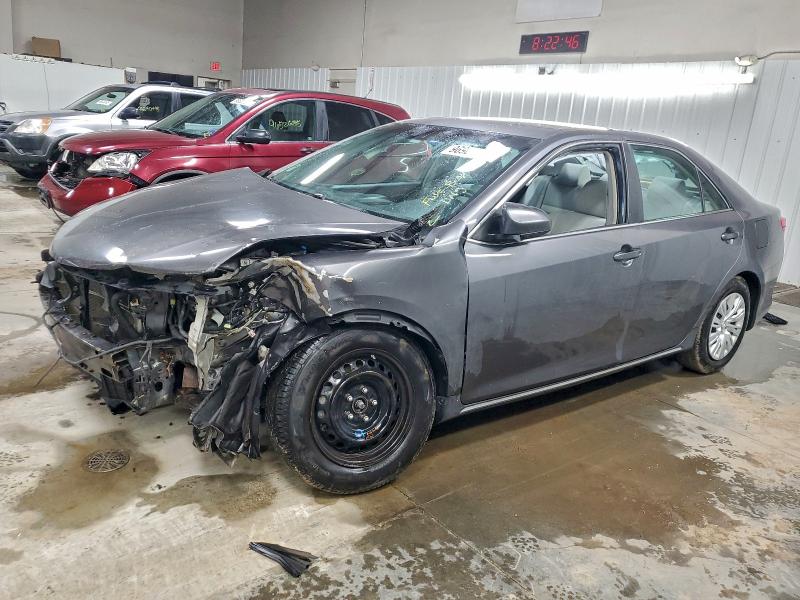 TOYOTA CAMRY HYBR 2014 with VIN 4T1BD1FK9EU098730 - Photo from auction