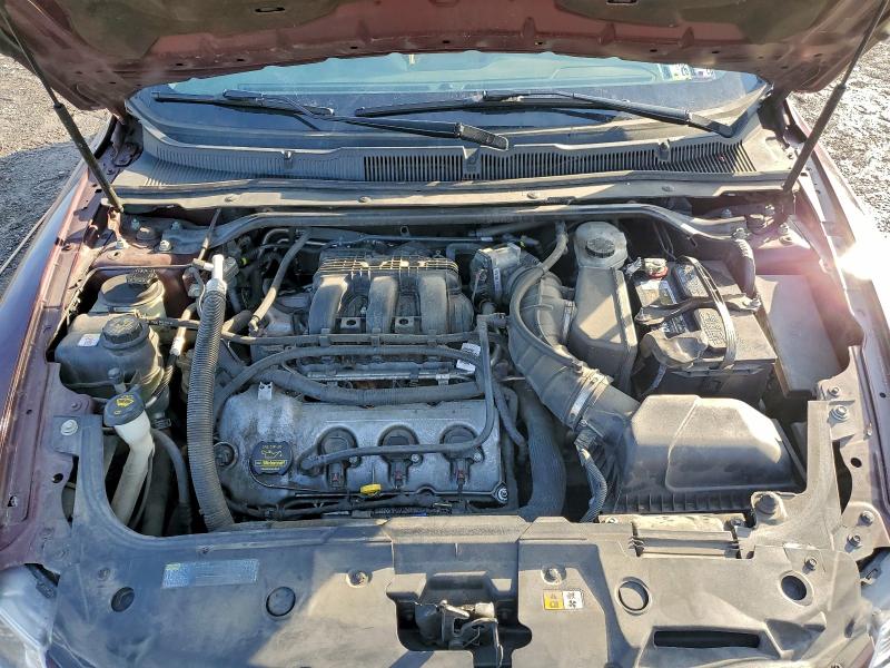 Photo 11 from auction – 2011 FORD TAURUS LIM with VIN 1FAHP2FW4BG128733
