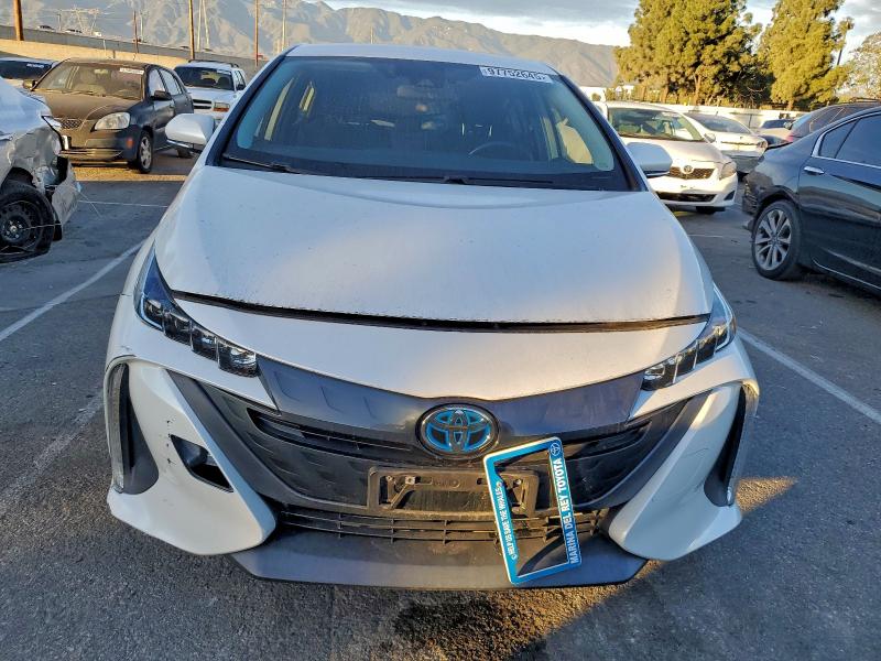 Photo 5 from auction – 2021 TOYOTA PRIUS PRIM with VIN JTDKAMFP4M3177883