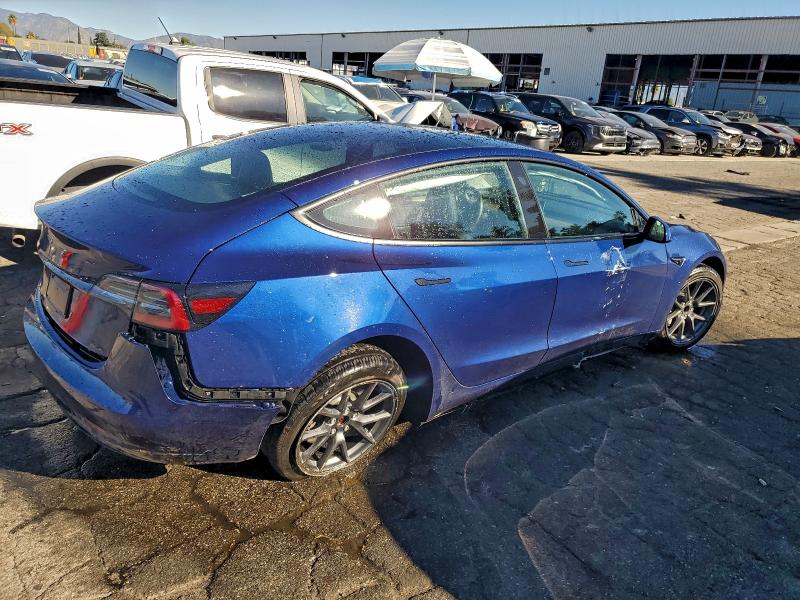 Photo 3 from auction – 2023 TESLA MODEL 3 with VIN 5YJ3E1EA3PF449030