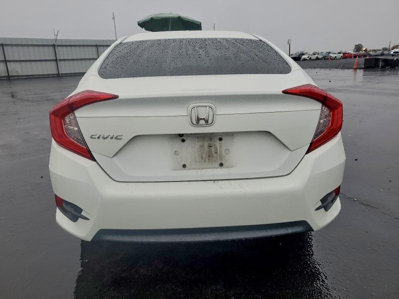 Photo 6 from auction – 2017 HONDA CIVIC LX with VIN 19XFC2F54HE206344