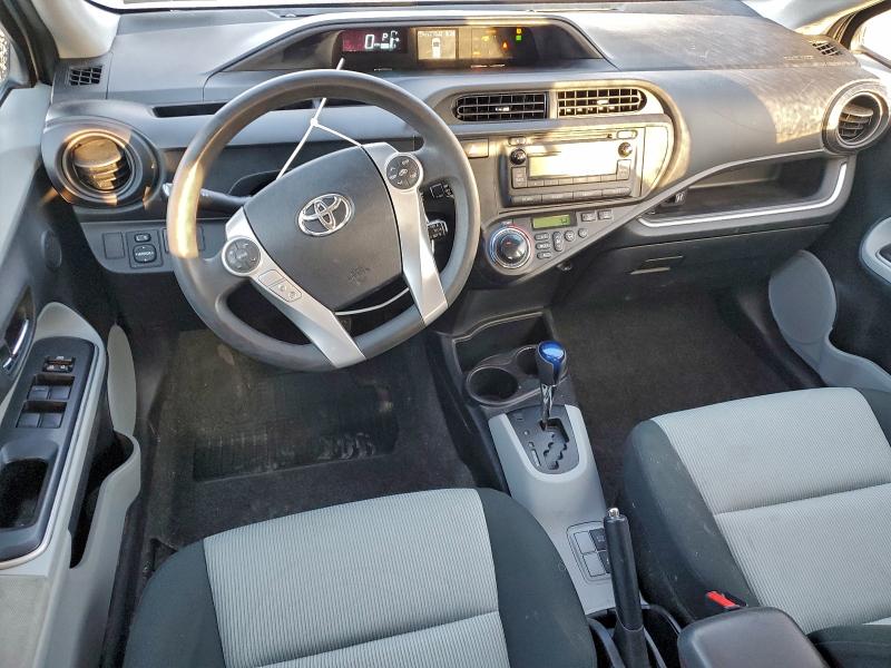 Photo 8 from auction – 2014 TOYOTA PRIUS C with VIN JTDKDTB37E1077973