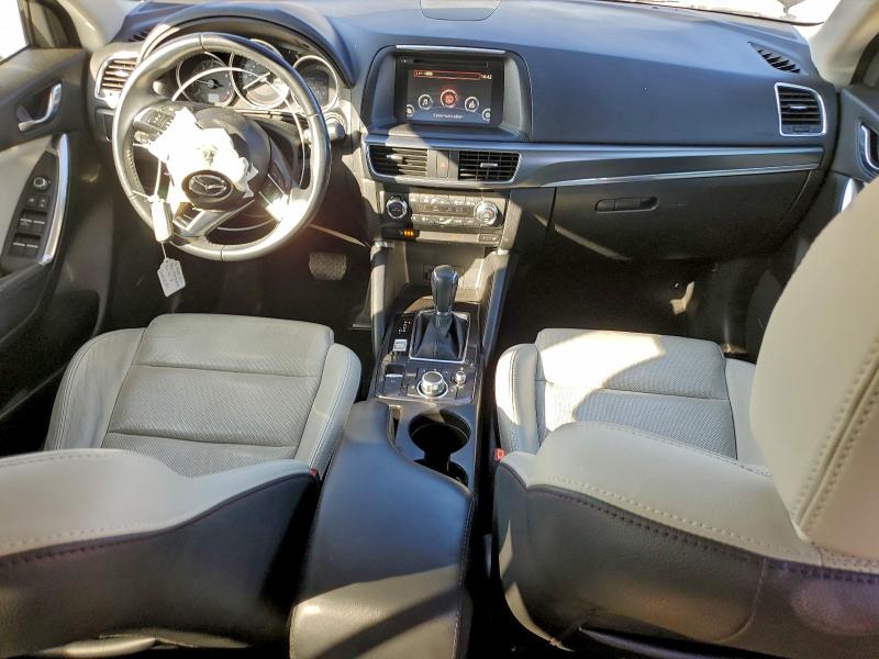Photo 8 from auction – 2016 MAZDA CX-5 GT with VIN JM3KE2DY8G0906999