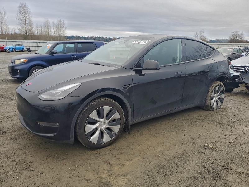 TESLA MODEL Y 2023 with VIN 7SAYGDEEXPF980930 - Photo from auction