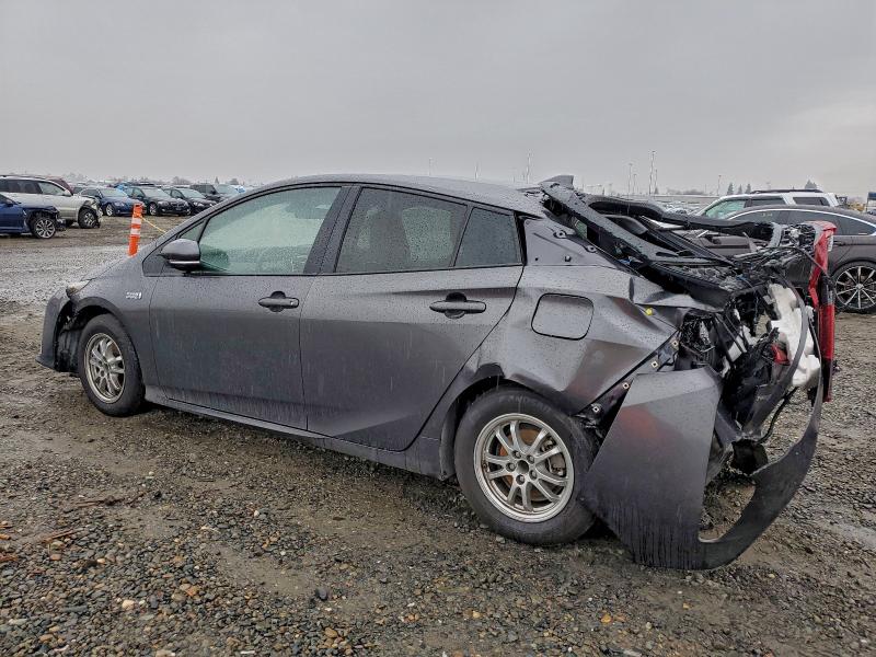 Photo 2 from auction – 2019 TOYOTA PRIUS PRIM with VIN JTDKARFP8K3106079