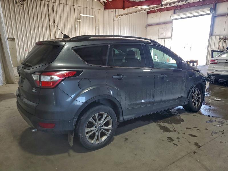 Photo 3 from auction – 2018 FORD ESCAPE SE with VIN 1FMCU9GD8JUC72607