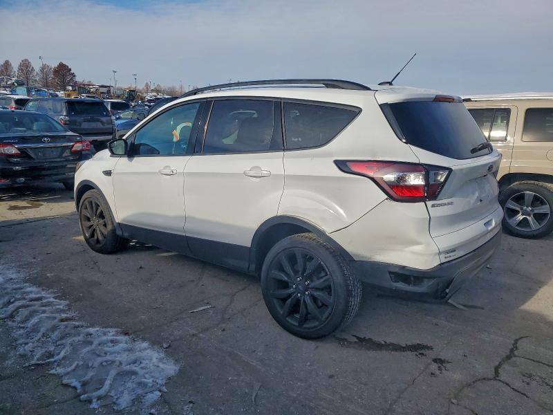 Photo 2 from auction – 2017 FORD ESCAPE SE with VIN 1FMCU9G98HUE35505