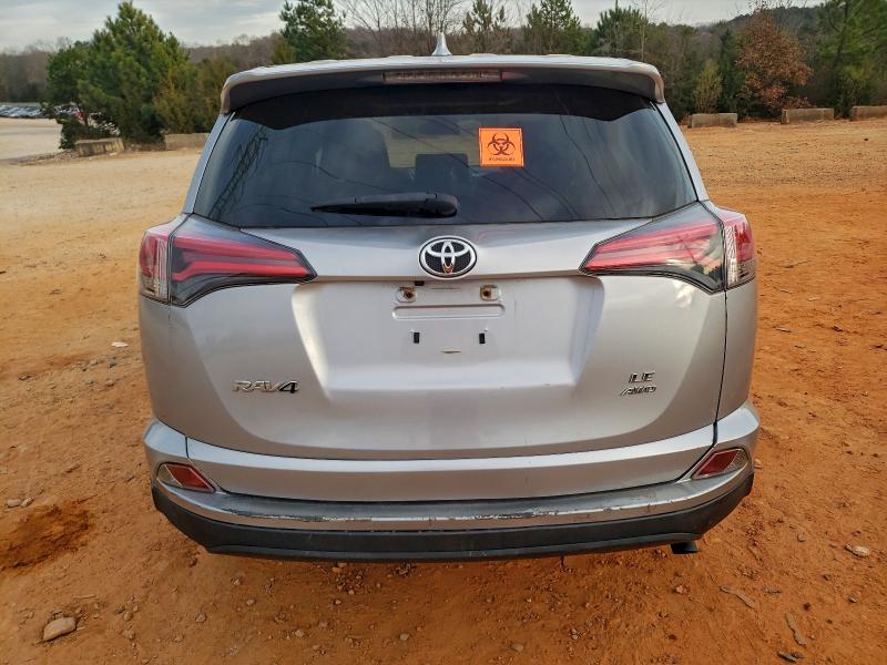 Photo 6 from auction – 2018 TOYOTA RAV4 LE with VIN JTMBFREVXJD252011
