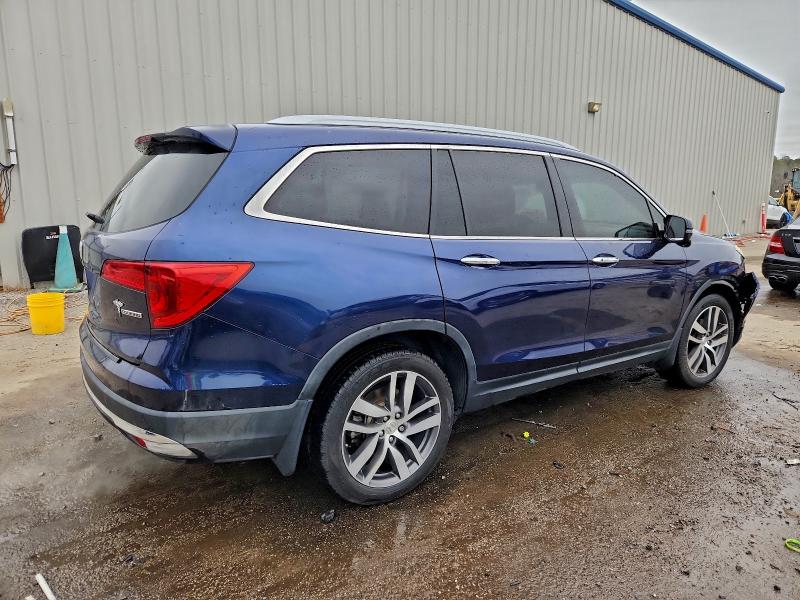 Photo 3 from auction – 2017 HONDA PILOT TOUR with VIN 5FNYF5H91HB004220