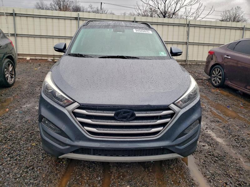 Photo 5 from auction – 2018 HYUNDAI TUCSON VAL with VIN KM8J3CA23JU642568