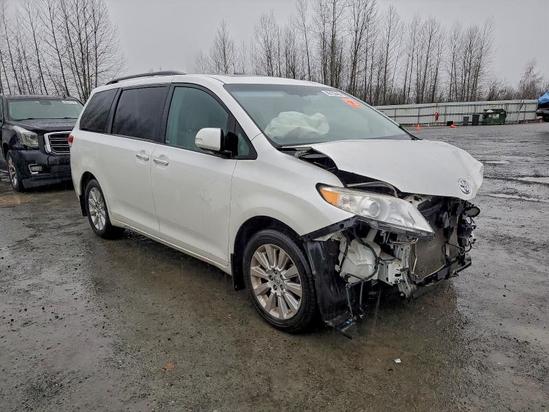 Photo 4 from auction – 2014 TOYOTA SIENNA XLE with VIN 5TDDK3DC2ES073618