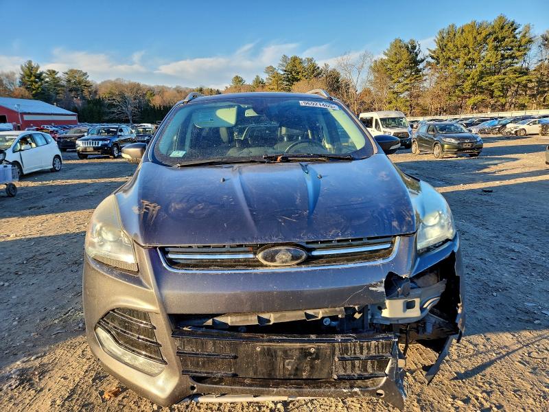 Photo 5 from auction – 2015 FORD ESCAPE TIT with VIN 1FMCU9JX1FUA72338