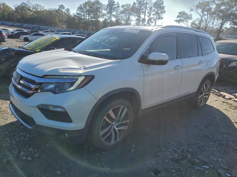 HONDA PILOT ELIT 2017 z numerem VIN 5FNYF6H06HB075274 - Zdjęcie z aukcji
