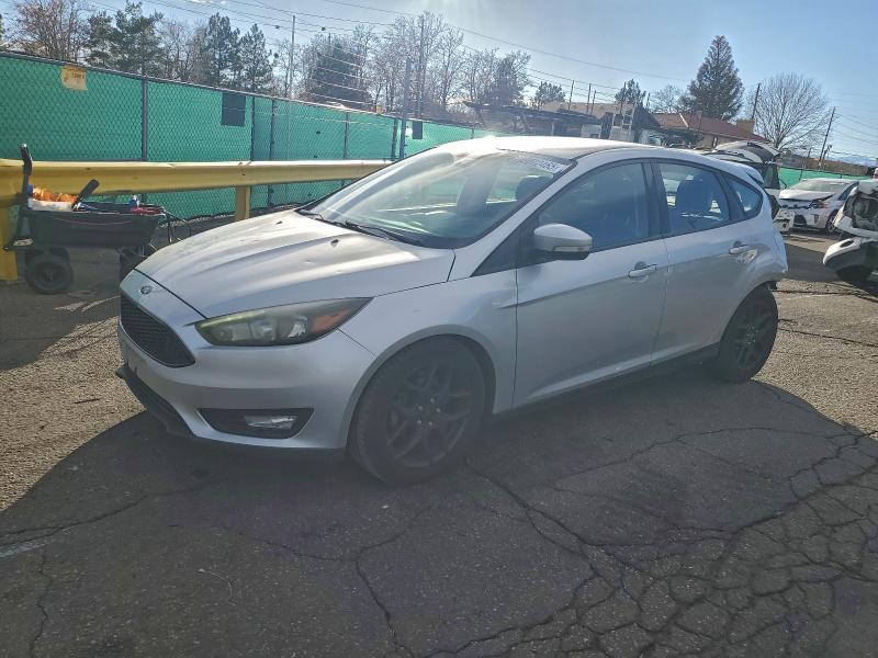 FORD FOCUS SE 2016 with VIN 1FADP3K21GL374094 - Photo from auction