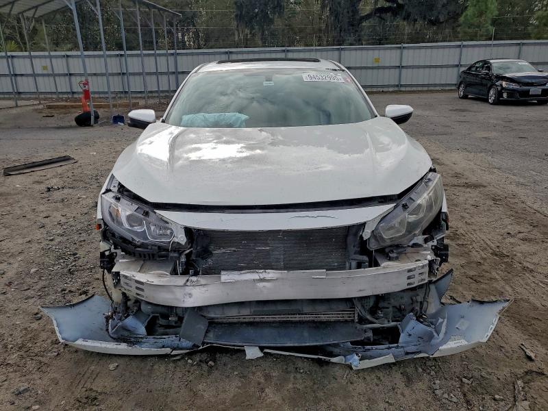 Photo 5 from auction – 2017 HONDA CIVIC EX with VIN 19XFC1F33HE207235