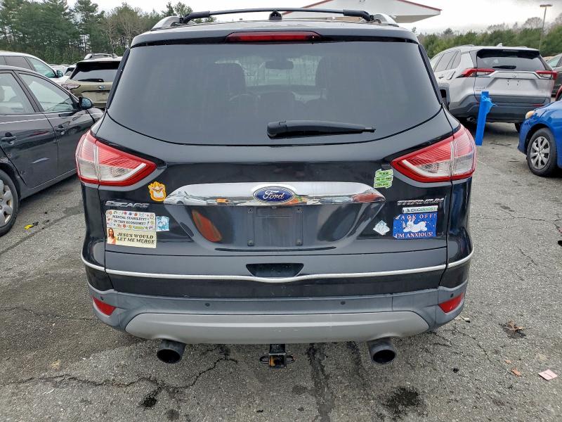 Photo 6 from auction – 2014 FORD ESCAPE with VIN 1FMCU0J95EUA93592