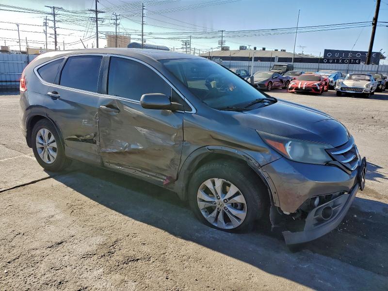 Photo 4 from auction – 2014 HONDA CR-V with VIN 3CZRM3H58EG701122
