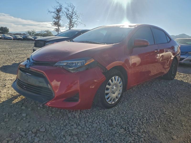 TOYOTA COROLLA L 2018 with VIN 5YFBURHE2JP756017 - Photo from auction
