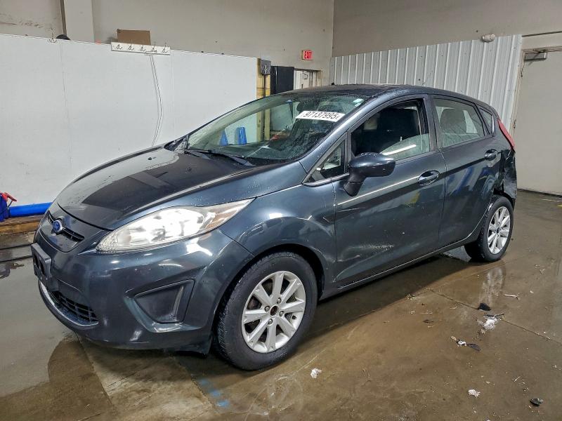 FORD FIESTA SE 2011 with VIN 3FADP4EJ8BM153883 - Photo from auction