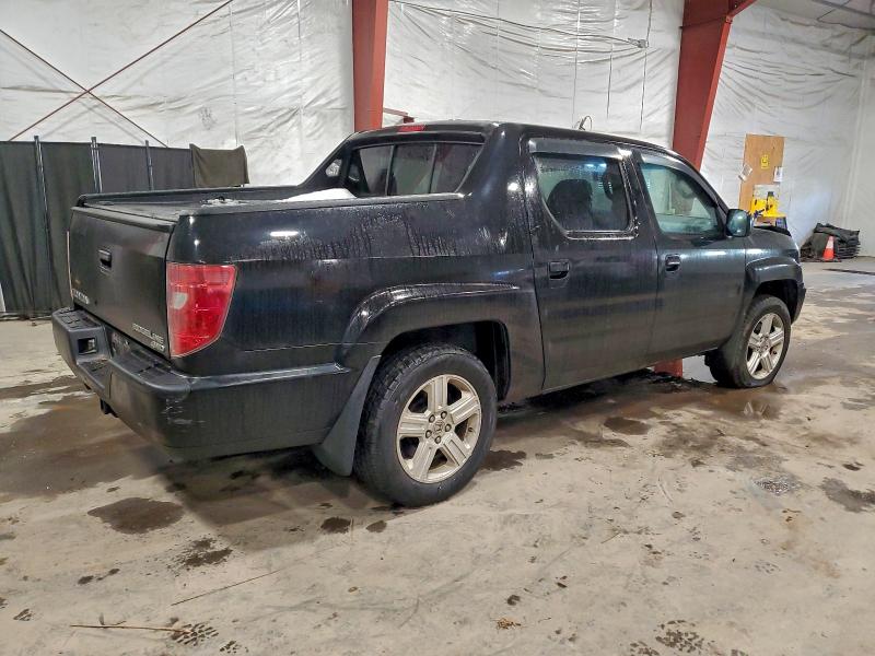 Photo 3 from auction – 2011 HONDA RIDGELINE with VIN 5FPYK1F5XBB006437
