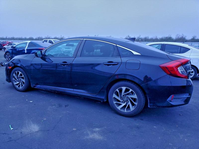 Photo 2 from auction – 2017 HONDA CIVIC EX with VIN 2HGFC2F74HH534287