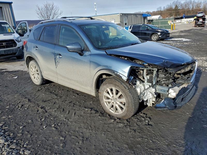 Photo 4 from auction – 2014 MAZDA CX-5 TOURI with VIN JM3KE4CY0E0409939
