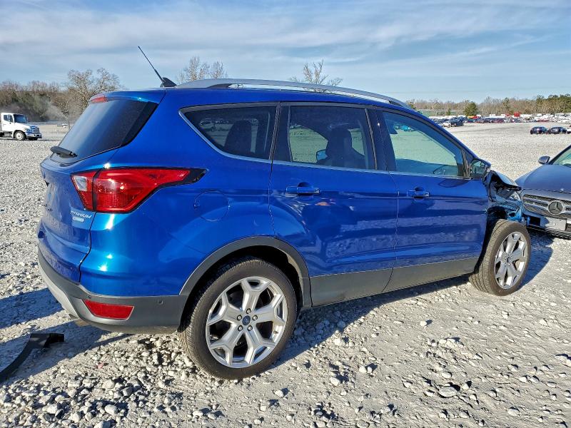 Photo 3 from auction – 2019 FORD ESCAPE TIT with VIN 1FMCU0J91KUB74536