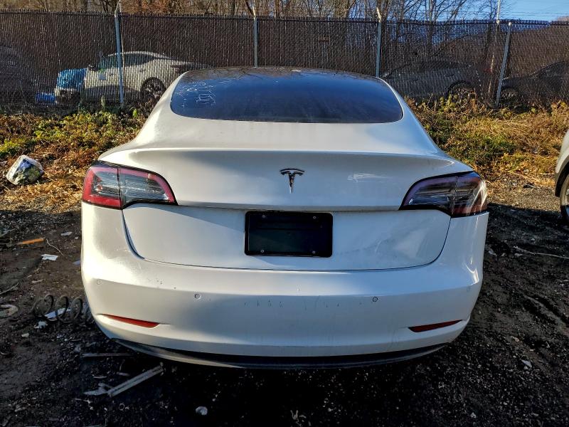 Photo 6 from auction – 2022 TESLA MODEL 3 with VIN 5YJ3E1EA8NF186644