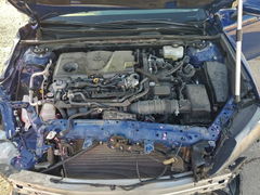 Photo 11 from auction – 2023 TOYOTA CAMRY with VIN 4T1K31AK2PU052007