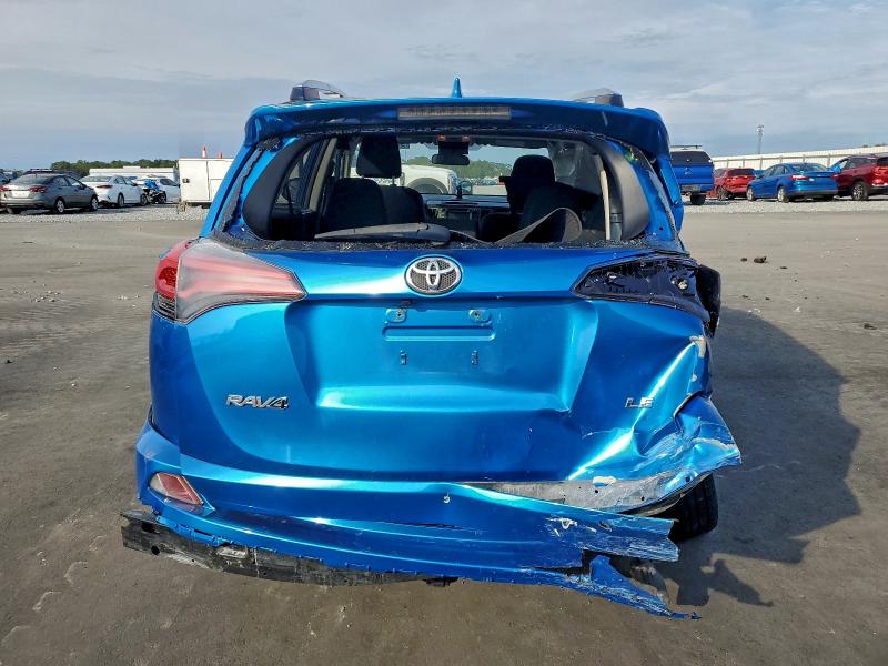 Photo 6 from auction – 2018 TOYOTA RAV4 LE with VIN JTMZFREV2JJ158480