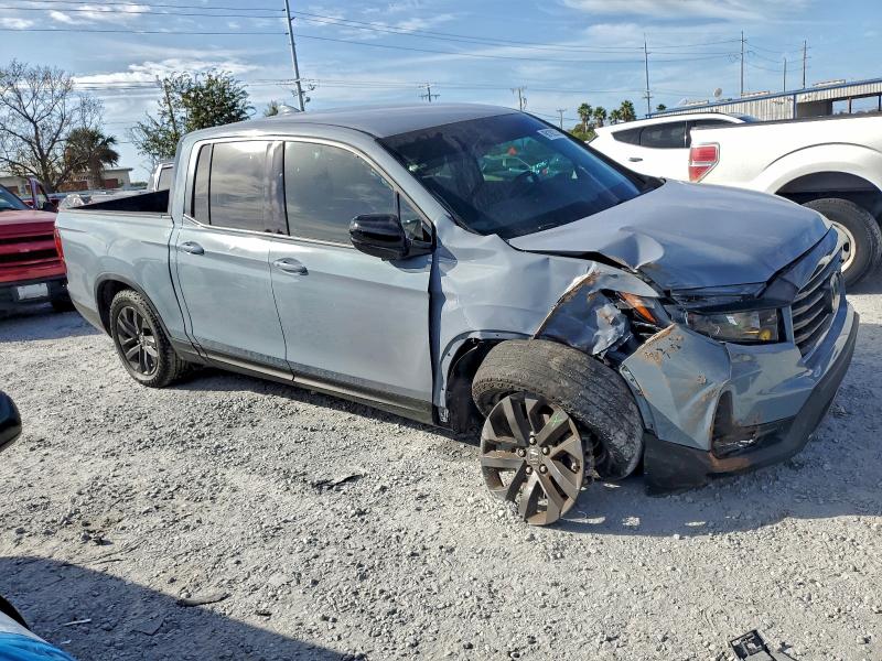 Photo 4 from auction – 2023 HONDA RIDGELINE with VIN 5FPYK3F15PB031150