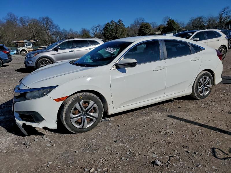 HONDA CIVIC LX 2017 with VIN 19XFC2F50HE024947 - Photo from auction