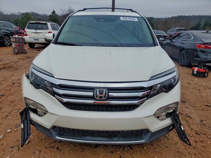 Photo 5 from auction – 2017 HONDA PILOT ELIT with VIN 5FNYF6H05HB100018
