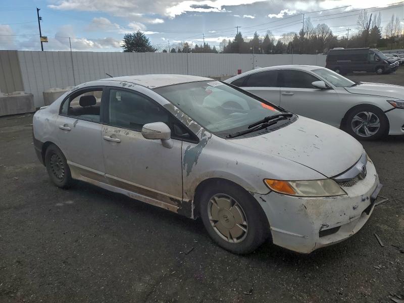 Photo 4 from auction – 2010 HONDA CIVIC HYBR with VIN JHMFA3F20AS005284