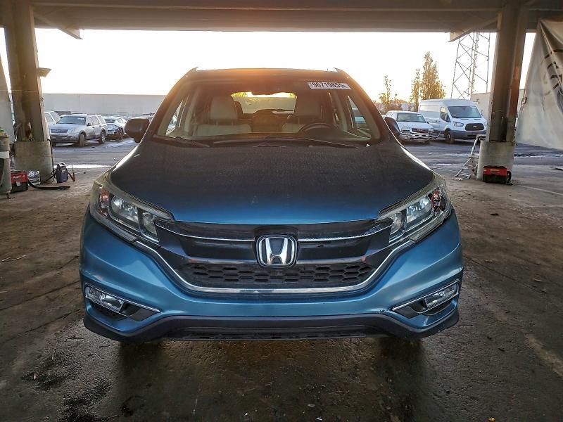 Photo 5 from auction – 2015 HONDA CR-V EXL with VIN 2HKRM3H72FH557518