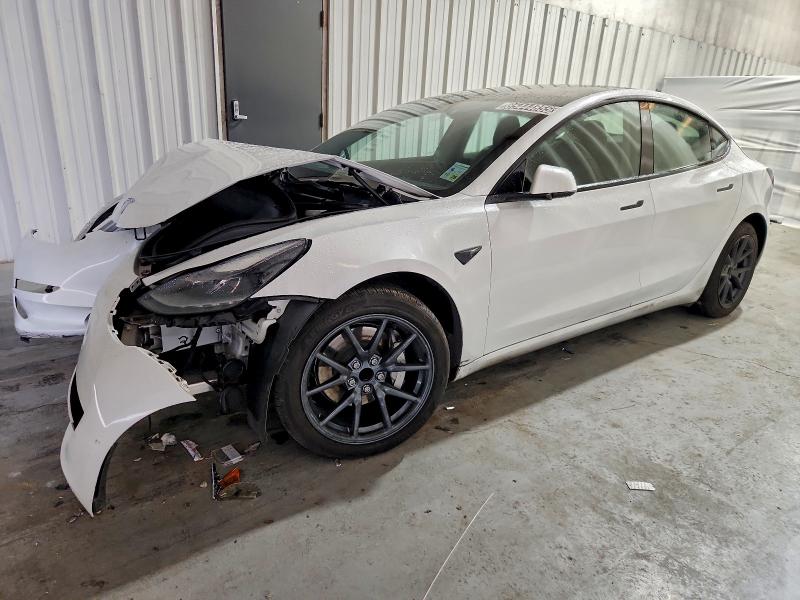TESLA MODEL 3 2023 with VIN 5YJ3E1EA7PF434935 - Photo from auction