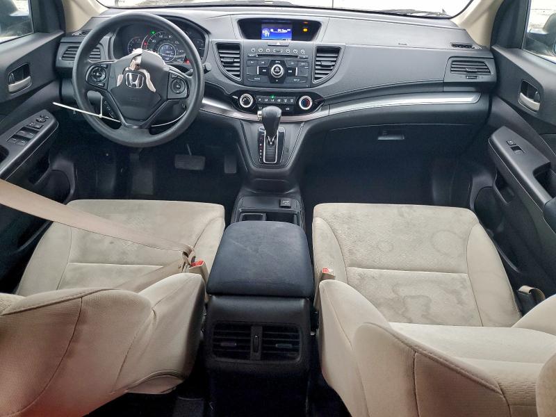 Photo 8 from auction – 2015 HONDA CR-V LX with VIN 5J6RM4H31FL047170