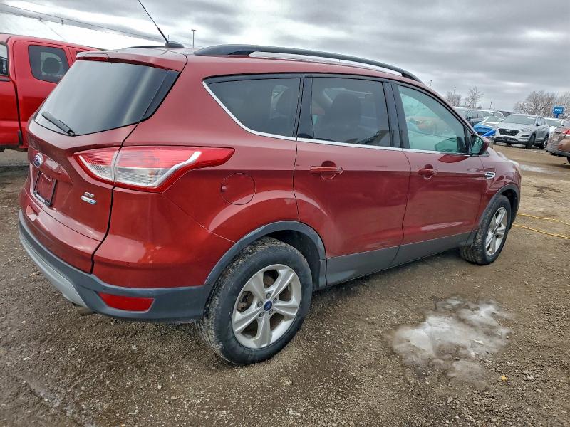 Photo 3 from auction – 2016 FORD ESCAPE SE with VIN 1FMCU9GX9GUB91683