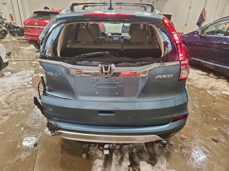 Photo 6 from auction – 2015 HONDA CR-V EXL with VIN 2HKRM4H77FH660679