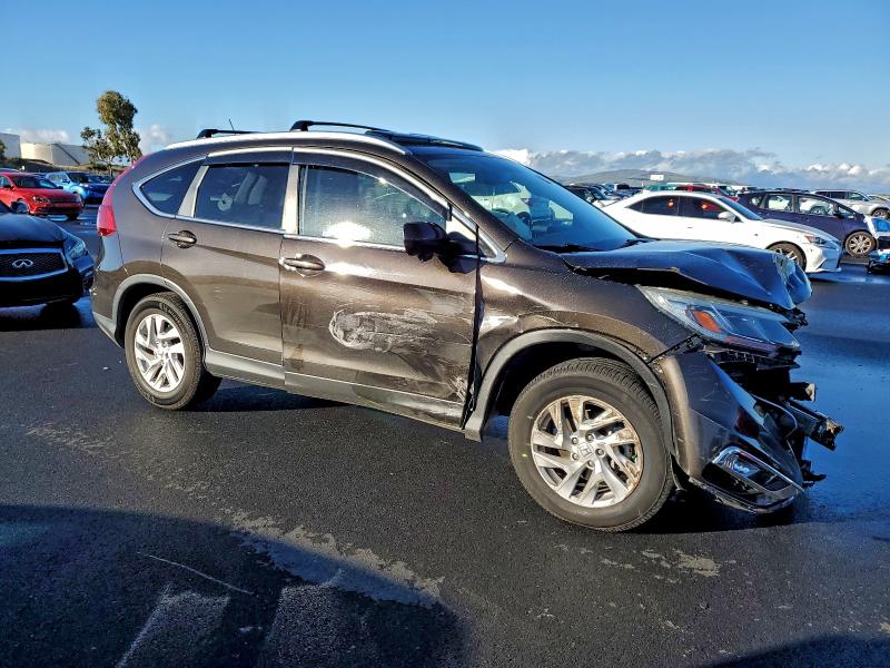 Photo 4 from auction – 2015 HONDA CR-V EXL with VIN 2HKRM3H77FH502224