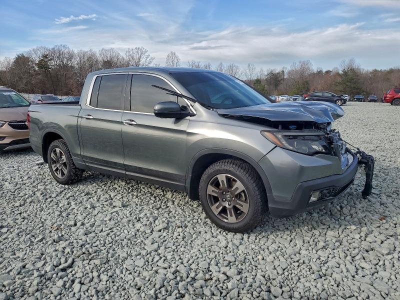 Photo 4 from auction – 2017 HONDA RIDGELINE with VIN 5FPYK3F70HB025133