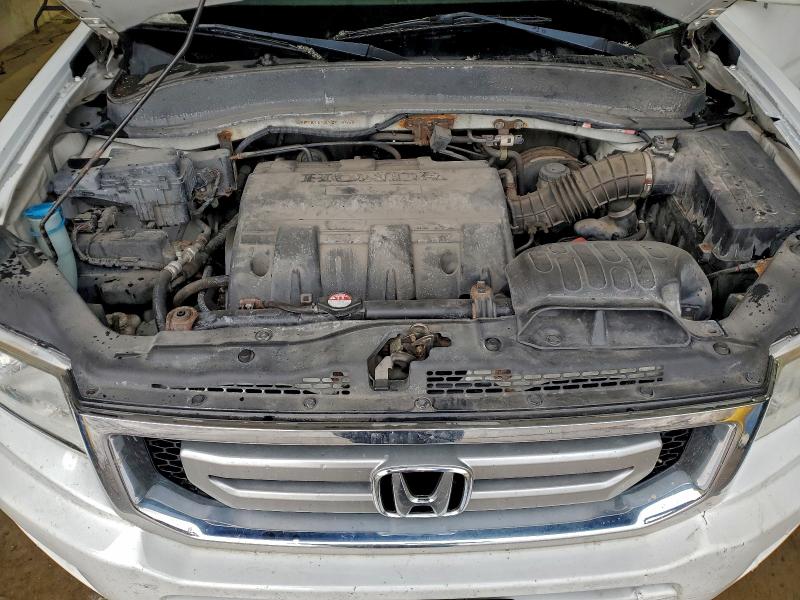 Photo 11 from auction – 2011 HONDA RIDGELINE with VIN 5FPYK1F58BB003455