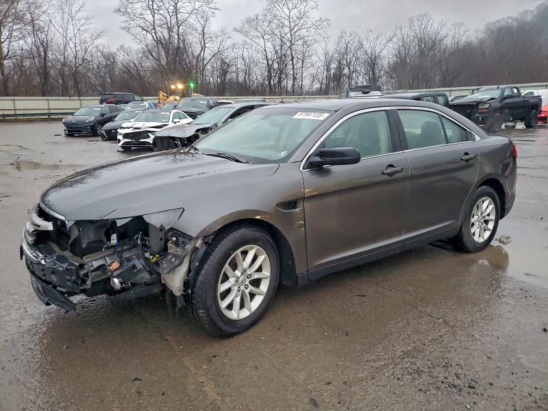 FORD TAURUS SE 2015 with VIN 1FAHP2D87FG102072 - Photo from auction