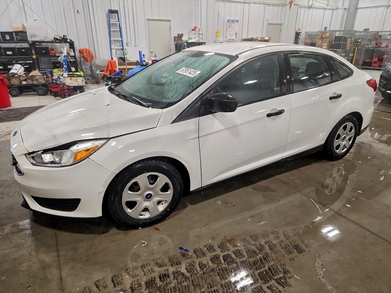FORD FOCUS S 2015 with VIN 1FADP3E20FL367888 - Photo from auction